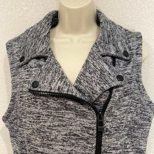 Calvin Klein Zippered gray and black vest.